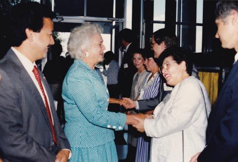 Miguel meeting First Lady Barbara Bush when he was Director of Public Information for Texas Southmost College (now UTRGV).